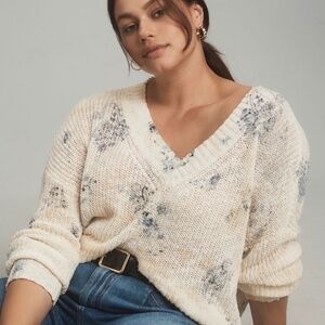 Anthropologie Pilcro Slouchy V-Neck Sweater in a cream and blue floral print.